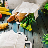 Papiertragetaschen weiß aus Kraftpapier mit Henkel