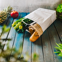 Papiertragetaschen weiß aus Kraftpapier mit Henkel